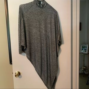 AX Paris bat wing poncho (one sleeve). New with tags. Size 4.